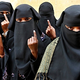 Illustration for article titled Muslim Women Give the Voting Finger
